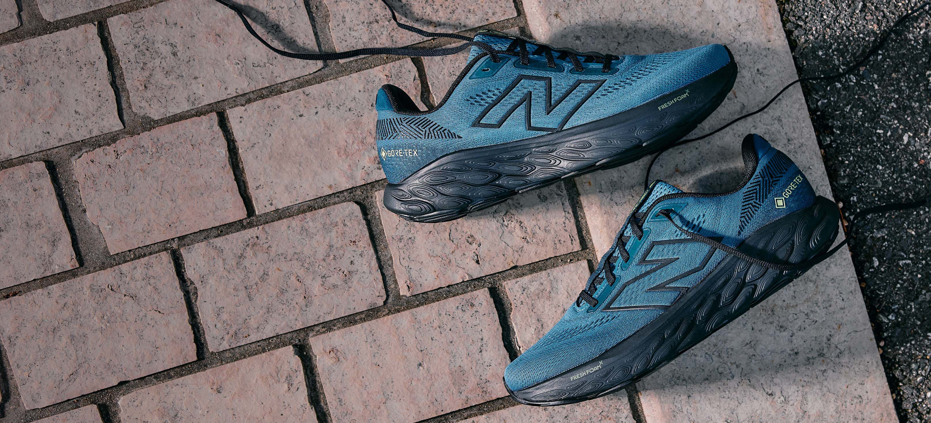 New balance qom uk top