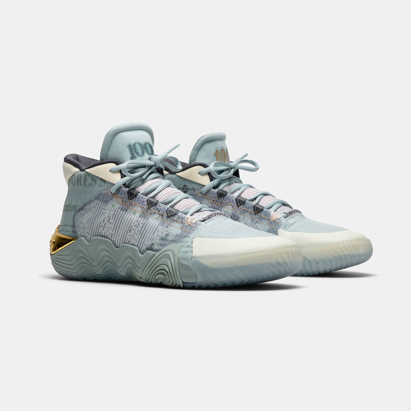 Both light blue shoes sitting on a light grey background.